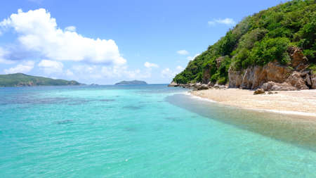 Beautiful tropical beach with white sand and clear water at Kho Kham Island, Chonburi Province, Thailand.の写真素材