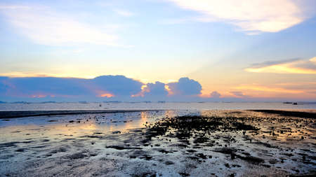 Sunset beach landscape, sea horizon at sunset, dramatic sunset colour.の写真素材