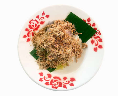Top view vintage plate of coconut  sticky rice with dried fish on white background.の写真素材