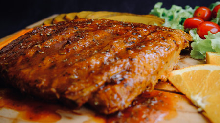Selective focus grill pork ribs on wooden board.の写真素材