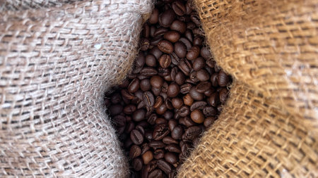 Top view coffee beans in a brown sack.の写真素材
