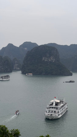 December`-17-2022 : Ha Long Bay , Vietnam : boat sightseeing around the islands on  Ha Long Bay.のeditorial素材