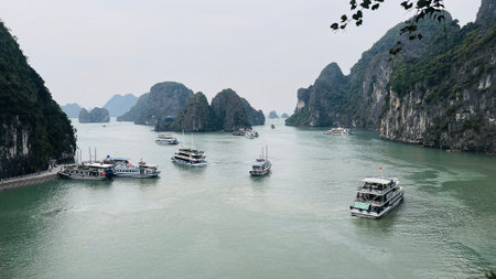 December`-17-2022 : Ha Long Bay , Vietnam : boat sightseeing around the islands on  Ha Long Bay.のeditorial素材