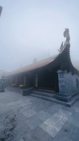 Sa Pa, Lao Cai, Vietnam â December 14, 2022 : Buddhist temple at Fansipan mountain in the foggy day.のeditorial素材