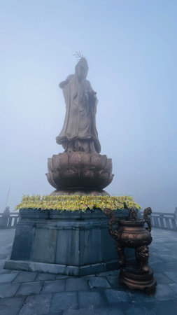 Sa Pa, Lao Cai, Vietnam â December 14, 2022 : Buddhist temple at Fansipan mountain in the foggy day.のeditorial素材