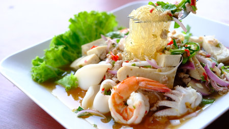 Spicy Glass Noodle Salad with  mixed seafood and ground pork. (Yum woon sen)の写真素材