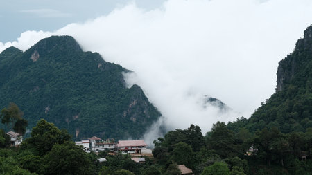 Scenic view of  misty mountain in rain  season at  Doi Pha Hee, Chiang Rai, Thailand.の写真素材