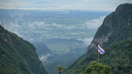 Scenic view of  misty mountain in rain  season at  Doi Pha Hee, Chiang Rai, Thailand.の写真素材