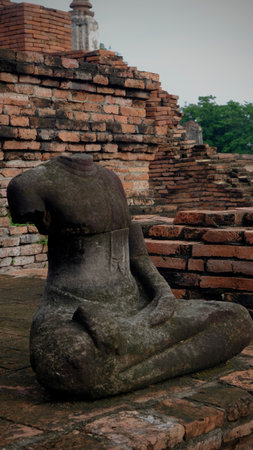 Headless buddha statue at Wat Mahathat historical park in Ayuttaya.の写真素材