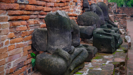 Headless buddha statue at Wat Mahathat historical park in Ayuttaya.の写真素材