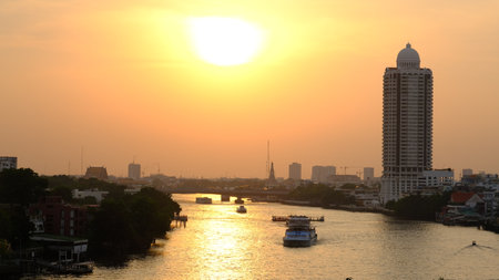 Aerial view of boat traffic on Chaopraya river at sunset.の写真素材
