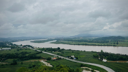 Aerial view of Golden Triangle, Thailand, the confluence of Ruak river and the Mekong river, where converge the borders of Thailand, Laos and Myanmar. (view from skywalk Wat Phra Tの写真素材