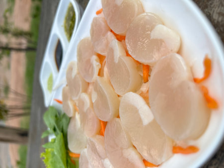 Fresh pen shell scallops Sashimi with wasabi sauce and spicy sauce Japanese food style.の写真素材