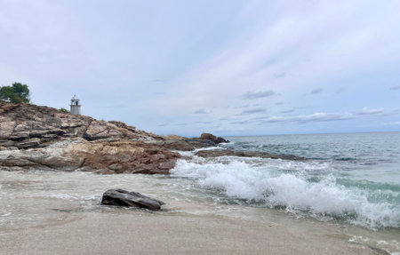 Sea waves splash to rocks on a coast, Sea waves hitting rocks on the beach.の写真素材