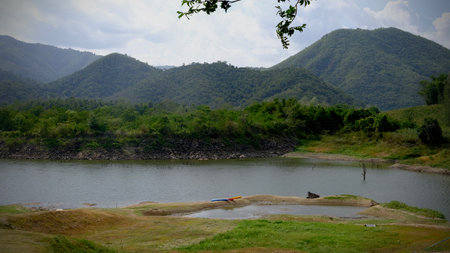 Panoramic view of lake and mountain at Ang kep Nam Tha Khoei, Ratchaburi province.の写真素材