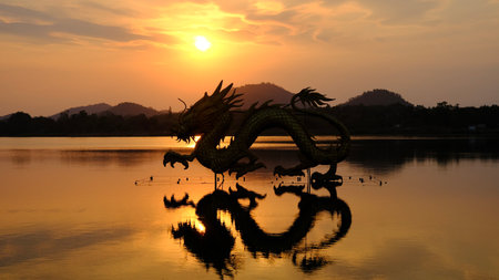 Beautiful view of golden dragon at sunset the landmark of Ang kep nam chat pa wai view point in Suanpueng, Ratchaburi province.の写真素材