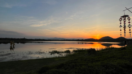 Beautiful sunset at Ang kep nam chat pa wai view point in Suanpueng, Ratchaburi province.の写真素材