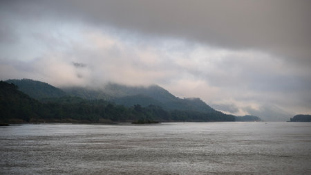 Mekong River and mountain with fog in the morning at  Luang Prabang, Laos.の写真素材