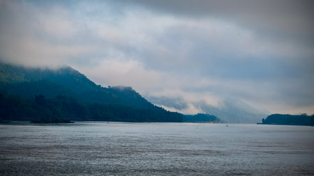 Mekong River and mountain with fog in the morning at  Luang Prabang, Laos.の写真素材