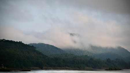 Mekong River and mountain with fog in the morning at  Luang Prabang, Laos.の写真素材