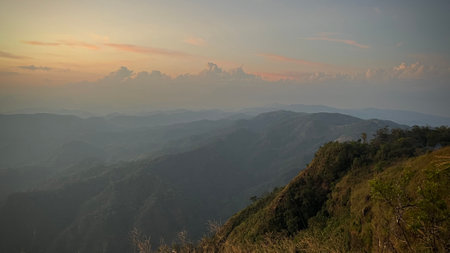 Beautiful sunset in Tak province, Thailand, mountain landscape with valleys and slopes.の写真素材