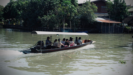 Tourist travel by longtail boat in the river, Thailand.の写真素材