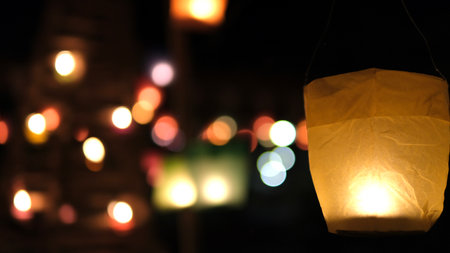 Colorful paper lanterns at night in the city. Bokehの写真素材