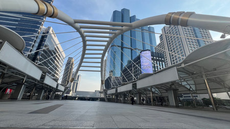 April 20 2025, Bangkok, Thailand : View of the skyscrapers and modern architecture bridge at Chong Nonsi Bts stationの写真素材
