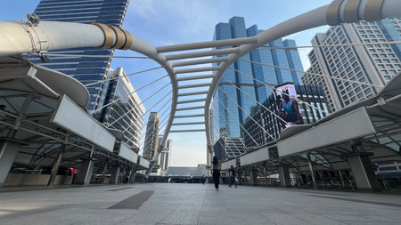 April 20 2025, Bangkok, Thailand : View of the skyscrapers and modern architecture bridge at Chong Nonsi Bts stationの写真素材