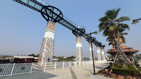 skywalk bridge in Kanchanaburi, Thailand, offers visitors a unique experience of walking on a clear glass bridge above the Khwae Yai or Si Sawat riverの写真素材