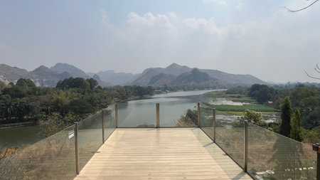 The view of the river and mountains from the terrace of the houseの写真素材