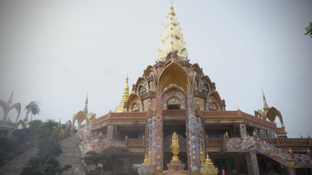 Beautiful Golden pagoda in the misty at Wat Phra That Pha Sorn Kaew, Petchabun, Thailand.の写真素材