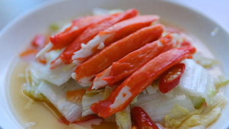 Table top view napa cabbage with crab stick isolate on white plateの写真素材