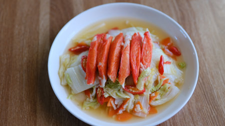 Table top view napa cabbage with crab stick isolate on white plateの写真素材