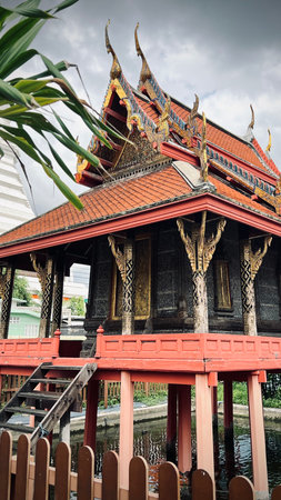 Bangkok, Thailand : Waterside scripture repository in Wat Apson Sawan Worawihanのeditorial素材