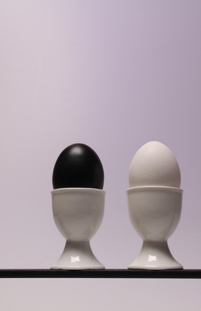 A black and a white egg  on a lineの写真素材