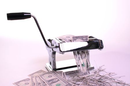 Money waisting pasta machine against a white bakgroundの写真素材