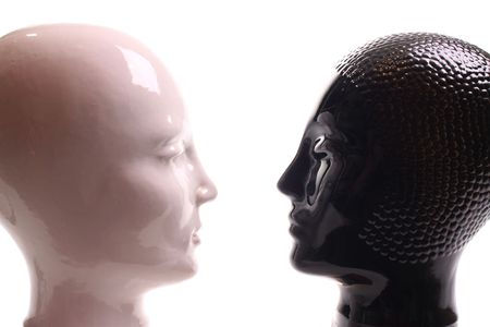 Black and white heads  communicating on a withe isolated background with copy spaceの写真素材