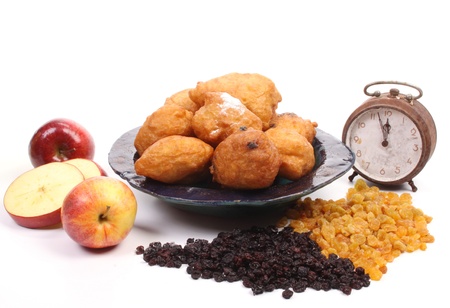 Dutch donuts with ingredients to make it like apple and raisinsの写真素材