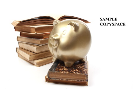 Pile of old educational books suggesting old financial booksの写真素材