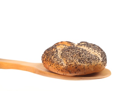 Bun on a spoon against a white backgroundの写真素材