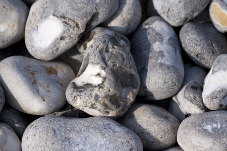 Flintstone on the beach along the coast of Normandie in France