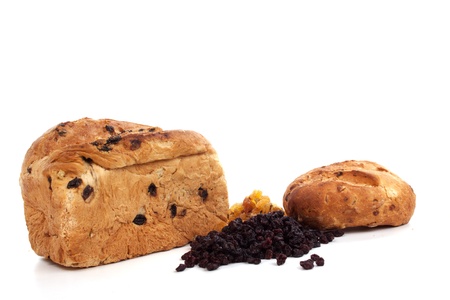 Currant-bread with raisins and currants against whiteの写真素材