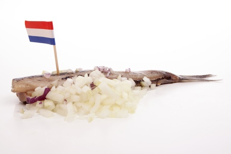 Typical Dutch salted herring called maatje or zoute haringの写真素材