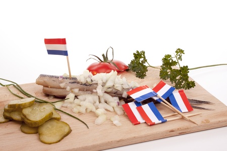 Typical Dutch salted herring called maatje or zoute haringの写真素材