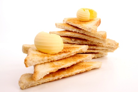 Various kinds of bread loaf and buns in a studio settingの写真素材