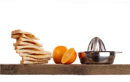 Various kinds of bread loaf and buns on a shelf in a studio settingの写真素材