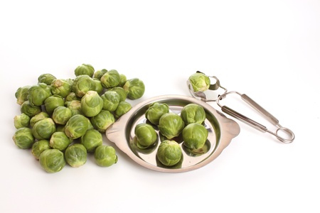 Brussels sprouts in a studio setting over whiteの写真素材