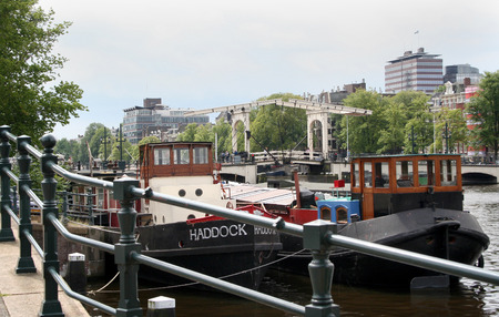 Netherlands, Amsterdam,june 2016: Houseboats in the river Amstelのeditorial素材