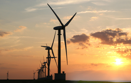 Eemshaven,Groningen, july 2016: Windturbines against sunset in Eemshavenのeditorial素材